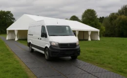 Temporary trackway providing vehicle access to marquee installation while protecting grassed landscape