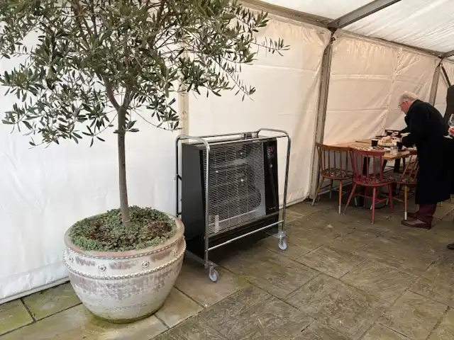 Close-up of Airrex radiant bio heater with digital temperature controls used for heating marquees and outdoor event spaces
